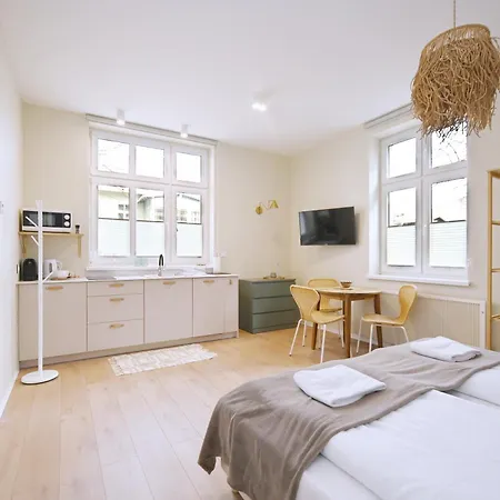 Daire Victus Apartamenty, Compassi